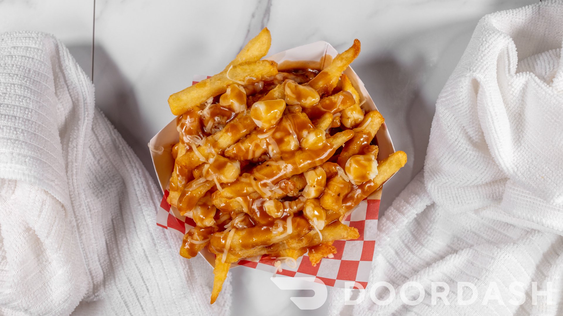 Poutine with fries, gravy, and cheese